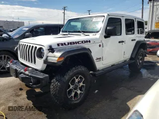 2022 Jeep Wrangler Unlimited Rubicon with VIN 1C4HJXFGXNW111687, listed as a Copart auction lot 69082344 with 7,558 mi miles and Salvage title. Bid and sale history available at DreamBid. Image 1.