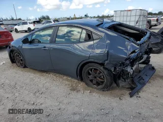 2024 Toyota Prius LE with VIN JTDACAAUXR3023011, listed as a Copart auction lot 61337595 with 25,660 mi miles and Non repairable. Bid and sale history available at DreamBid. Image 2.