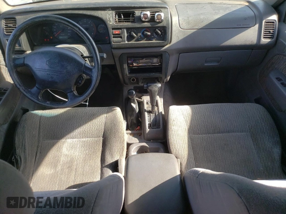 2000 Nissan Frontier XE z VIN 1N6ED27Y3YC324102, wystawiony jako Copart lot #56922155 z przebiegiem 202 233 mil mil oraz Szkoda całkowita • Salvage title. Historia ofert i sprzedaży dostępna na DreamBid. Obrazek 8.