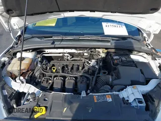 2016 Ford Focus SE with VIN 1FADP3F25GL339312, listed as a IAAI auction lot 41758115 with 77,972 mi miles. Bid and sale history available at carsss.com. Image 10.