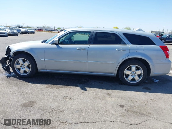 2005 Dodge Magnum z VIN 2D8GZ58235H576127, wystawiony jako IAAI lot #41989680 z przebiegiem 136 488 mil mil oraz . Historia ofert i sprzedaży dostępna na DreamBid. Obrazek 15.