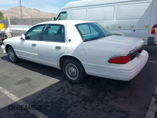 1996 Mercury Grand Marquis GS with VIN 2MELM74WXTX650841, listed as a IAAI auction lot 41936608 with 205,964 mi miles and . Bid and sale history available at DreamBid. Image 3.