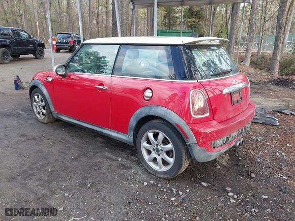 2009 MINI Cooper Hardtop S with VIN WMWMF735X9TT97788, listed as a IAAI auction lot 41925351 with 150,858 mi miles. Bid and sale history available at carsss.com. Image 3.