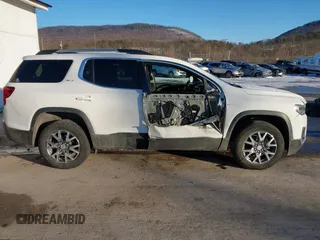 2023 GMC Acadia SLT z VIN 1GKKNUL47PZ205518, wystawiony jako IAAI lot #41322266 z przebiegiem 27 712 mil mil oraz . Historia ofert i sprzedaży dostępna na DreamBid. Obrazek 6.