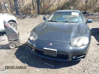 1999 Mitsubishi 3000GT GT z VIN JA3AM84JXXY001953, wystawiony jako IAAI lot #41834925 z przebiegiem 132 335 mil mil oraz . Historia ofert i sprzedaży dostępna na DreamBid. Obrazek 6.