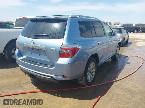 2009 Toyota Highlander Hybrid with VIN JTEEW41AX92033863, listed as a IAAI auction lot 41788531 with 215,787 mi miles. Bid and sale history available at carsss.com. Image 4.