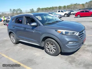 2018 Hyundai Tucson SEL with VIN KM8J3CA48JU718402, listed as a IAAI auction lot 41810363 with 218,853 mi miles. Bid and sale history available at carsss.com. Image 1.