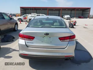 2016 Kia Optima LX with VIN 5XXGT4L32GG009150, listed as a IAAI auction lot 41761139 with 114,081 mi miles. Bid and sale history available at carsss.com. Image 16.