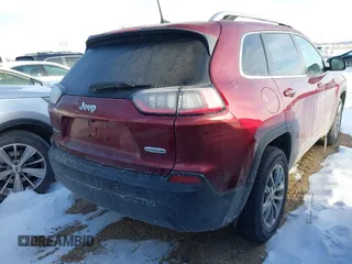 2019 Jeep Cherokee Latitude Plus with VIN 1C4PJMLB6KD465474, listed as a IAAI auction lot 41563058 with 74,680 mi miles. Bid and sale history available at carsss.com. Image 4.