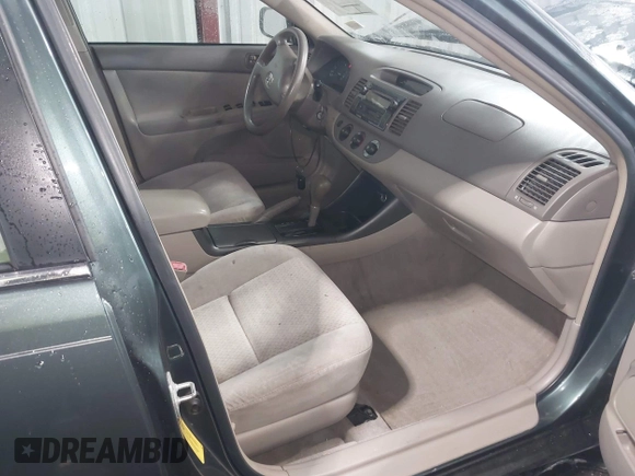 2004 Toyota Camry LE with VIN 4T1BE30K54U377818, listed as a IAAI auction lot 41931027 with 212,690 mi miles. Bid and sale history available at carsss.com. Image 5.