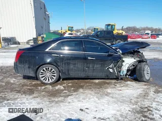 2014 Cadillac CTS Luxury AWD with VIN 1G6AX5SX3E0191673, listed as a IAAI auction lot 41617087 with 68,581 mi miles and . Bid and sale history available at DreamBid. Image 13.