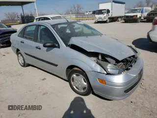 2003 Ford Focus LX с VIN 1FAFP33P63W187283, выставлен на аукционе Copart как лот 48803575 с пробегом Не указан миль и Списание • Salvage title. История ставок и продаж доступна на DreamBid. Изображение 4.
