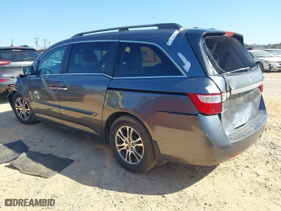 2012 Honda Odyssey EX-L with VIN 5FNRL5H64CB066240, listed as a IAAI auction lot 41792321 with 186,895 mi miles. Bid and sale history available at carsss.com. Image 3.