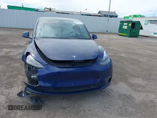 2021 Tesla Model Y Performance z VIN 5YJYGDEF8MF245641, wystawiony jako IAAI lot #41685230 z przebiegiem 25 903 mil mil oraz . Historia ofert i sprzedaży dostępna na DreamBid. Obrazek 11.