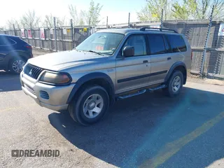2003 Mitsubishi Montero Sport ES with VIN JA4MT21H93J046492, listed as a IAAI auction lot 42023037 with 181,406 mi miles. Bid and sale history available at carsss.com. Image 2.