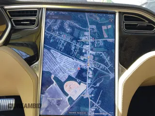 2014 Tesla Model S 60 with VIN 5YJSA1H1XEFP34226, listed as a IAAI auction lot 41806604 with 216,021 mi miles and . Bid and sale history available at DreamBid. Image 18.