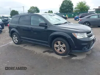 2012 Dodge Journey SXT with VIN 3C4PDCBG7CT202310, listed as a IAAI auction lot 42719522 with 111,877 mi miles and . Bid and sale history available at DreamBid. Image 1.