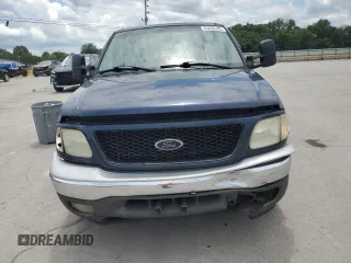 2003 Ford F-150 XL with VIN 2FTRX17L83CA53082, listed as a Copart auction lot 63836305 with 219,269 mi miles and Salvage title. Bid and sale history available at DreamBid. Image 5.