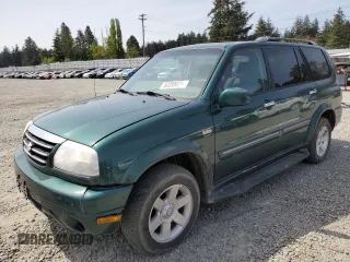 2001 Suzuki XL7 Standard z VIN JS3TX92V314114785, wystawiony jako Copart lot #53395035 z przebiegiem 232 895 mil mil oraz Szkoda całkowita • Salvage title. Historia ofert i sprzedaży dostępna na DreamBid. Obrazek 1.