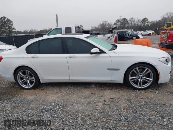2014 BMW 7 Series 740i with VIN WBAYA6C51ED144387, listed as a IAAI auction lot 41226638 with 161,448 mi miles. Bid and sale history available at carsss.com. Image 13.