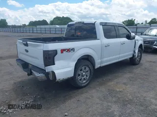 2018 Ford F-150 XL with VIN 1FTEW1E50JKC91068, listed as a IAAI auction lot 42221345 with 135,095 mi miles and . Bid and sale history available at DreamBid. Image 4.