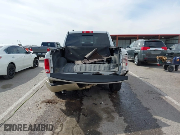 2014 Ram 1500 Longhorn Limited with VIN 1C6RR7PT9ES127063, listed as a IAAI auction lot 41817112 with 126,203 mi miles and . Bid and sale history available at DreamBid. Image 17.