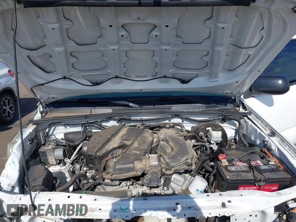 2014 Toyota Tacoma with VIN 3TMMU4FN9EM062808, listed as a IAAI auction lot 41450058 with 192,628 mi miles and . Bid and sale history available at DreamBid. Image 10.