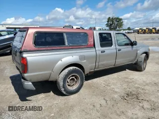 2004 Nissan Frontier XE with VIN 1N6ED29X24C436064, listed as a Copart auction lot 58916434 with 277,026 mi miles and Salvage title. Bid and sale history available at DreamBid. Image 3.