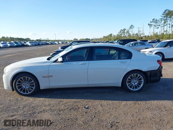2014 BMW 7 Series ALPINA B7 with VIN WBAYE8C59ED134562, listed as a IAAI auction lot 41806222 with 120,043 mi miles. Bid and sale history available at carsss.com. Image 14.