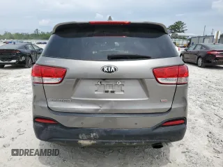 2018 Kia Sorento LX z VIN 5XYPG4A31JG406679, wystawiony jako Copart lot #55087315 z przebiegiem 146 171 mil mil oraz Szkoda całkowita • Salvage title. Historia ofert i sprzedaży dostępna na DreamBid. Obrazek 6.