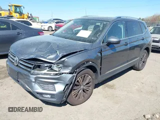 2018 Volkswagen Tiguan SEL with VIN 3VV3B7AX5JM036164, listed as a IAAI auction lot 41876403 with 108,269 mi miles and . Bid and sale history available at DreamBid. Image 2.
