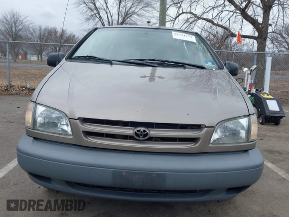 1999 Toyota Sienna LE with VIN 4T3ZF13C5XU121145, listed as a IAAI auction lot 41721171 with 229,760 mi miles and . Bid and sale history available at DreamBid. Image 12.