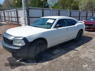 2007 Dodge Charger with VIN 2B3KA43GX7H838257, listed as a IAAI auction lot 41963059 with 215,876 mi miles. Bid and sale history available at carsss.com. Image 1.