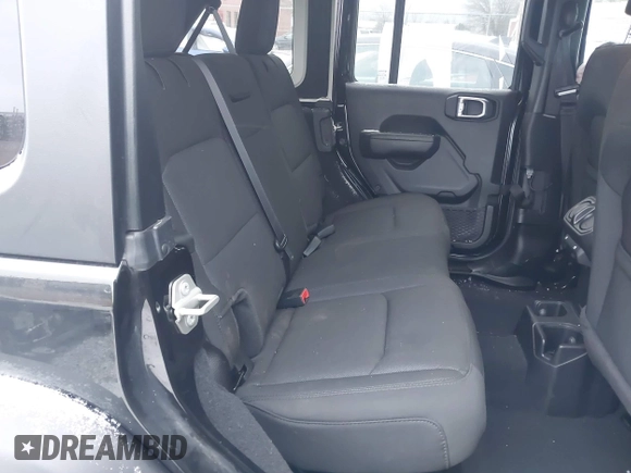 2023 Jeep Wrangler Sport S with VIN 1C4HJXDG8PW653828, listed as a IAAI auction lot 41239974 with 16,076 mi miles and . Bid and sale history available at DreamBid. Image 8.