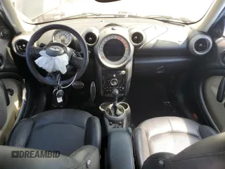 2012 MINI Countryman S z VIN WMWZC5C52CWL55608, wystawiony jako Copart lot #56424275 z przebiegiem 126 669 mil mil oraz Szkoda całkowita • Salvage title. Historia ofert i sprzedaży dostępna na DreamBid. Obrazek 8.