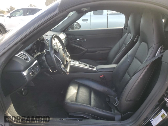 2014 Porsche Boxster with VIN WP0CA2A84ES121667, listed as a Copart auction lot 87510945 with 62,689 mi miles and Salvage title. Bid and sale history available at DreamBid. Image 7.