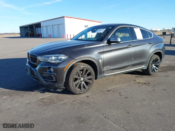 2015 BMW X6 xDrive35i with VIN 5UXKU2C50F0N77926, listed as a IAAI auction lot 41681268 with 136,118 mi miles. Bid and sale history available at carsss.com. Image 17.