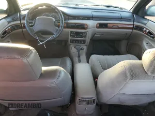 1993 Chrysler Concorde z VIN 2C3EL56T9PH636017, wystawiony jako Copart lot #80644804 z przebiegiem 124 677 mil mil oraz Szkody całkowita. Historia ofert i sprzedaży dostępna na DreamBid. Obrazek 8.