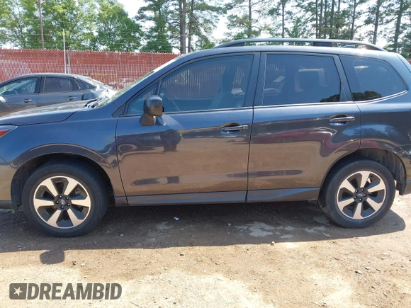 2018 Subaru Forester z VIN JF2SJABC9JH457297, wystawiony jako IAAI lot #42052293 z przebiegiem 94 058 mil mil oraz . Historia ofert i sprzedaży dostępna na DreamBid. Obrazek 14.