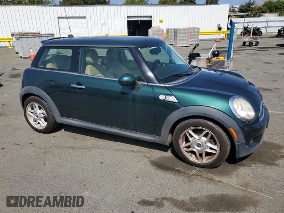 2009 MINI Hardtop S with VIN WMWMF73539TW85698, listed as a Copart auction lot 54957685 with 98,429 mi miles and Clean Title. Bid and sale history available at DreamBid. Image 4.
