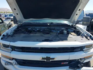 2016 Chevrolet Silverado 1500 LT with VIN 3GCUKREC5GG369915, listed as a IAAI auction lot 42082155 with 137,671 mi miles and . Bid and sale history available at DreamBid. Image 10.
