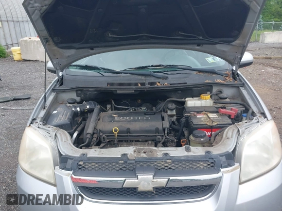 2009 Chevrolet Aveo 1LT z VIN KL1TD56E39B643484, wystawiony jako IAAI lot #42359233 z przebiegiem 88 974 mil mil oraz . Historia ofert i sprzedaży dostępna na DreamBid. Obrazek 10.