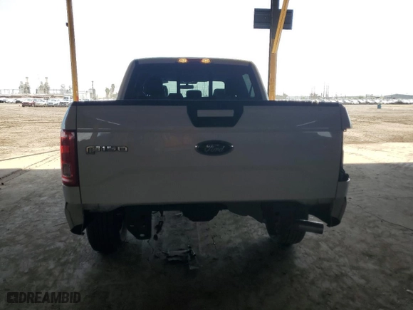 2016 Ford F-150 XLT with VIN 1FTEW1EP2GKE47833, listed as a Copart auction lot 52779915 with 117,210 mi miles and Salvage Title. Bid and sale history available at carsss.com. Image 6.