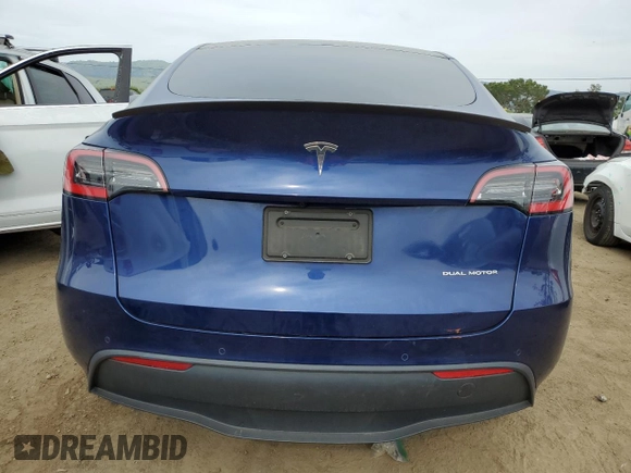 2021 Tesla Model Y Long Range with VIN 5YJYGDEE9MF095417, listed as a Copart auction lot 52960515 with 39,528 mi miles and Salvage Title. Bid and sale history available at DreamBid. Image 6.