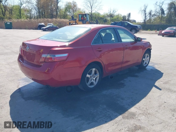 2007 Toyota Camry CE with VIN JTNBE46K073031988, listed as a IAAI auction lot 42062321 with 238,925 mi miles. Bid and sale history available at carsss.com. Image 4.
