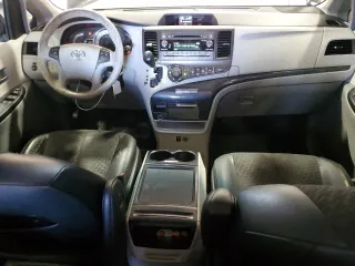 2014 Toyota Sienna SE with VIN 5TDXK3DC5ES418508, listed as a Copart auction lot 69742974 with 210,168 mi miles and Salvage Title. Bid and sale history available at DreamBid. Image 8.