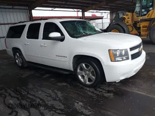 2014 Chevrolet Suburban LT with VIN 1GNSCJE05ER153658, listed as a IAAI auction lot 41867781 with 252,098 mi miles. Bid and sale history available at carsss.com. Image 1.