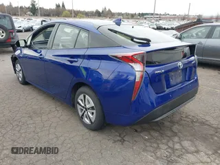 2018 Toyota Prius Two with VIN JTDKBRFU8J3067821, listed as a IAAI auction lot 41767013 with 82,285 mi miles and . Bid and sale history available at carsss.com. Image 3.