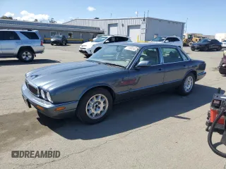 1998 Jaguar XJ with VIN SAJHX1247WC841374, listed as a Copart auction lot 51693595 with 109,509 mi miles and Clean Title. Bid and sale history available at DreamBid. Image 1.