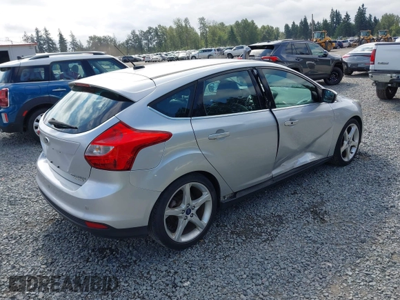 2014 Ford Focus Titanium with VIN 1FADP3N20EL160982, listed as a IAAI auction lot 42565322 with 112,551 mi miles and . Bid and sale history available at DreamBid. Image 4.